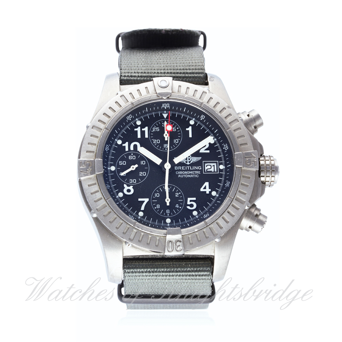 A GENTLEMAN`S TITANIUM BREITLING CHRONO AVENGER CHRONOGRAPH WRIST WATCH DATED 2010, REF. E13360 WITH