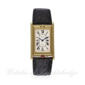 A FINE & RARE GENTLEMAN`S 18K SOLID GOLD CARTIER TANK BASCULANTE WRIST WATCH DATED 1994, REF. 017-91