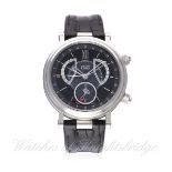 A GENTLEMAN'S STAINLESS STEEL VAN CLEEF & ARPELS MONSIEUR ARPELS REVEIL GMT WRIST WATCH CIRCA