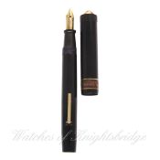 A RARE DUNHILL NAMIKI FLAT TOP FOUNTAIN PEN CIRCA 1930  A black lacquered body and cap with Maki-e