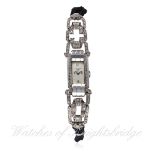 A LADIES PLATINUM & DIAMOND BAUME & MERCER COCKTAIL WATCH CIRCA 1930
D: Silver dial with quarterly