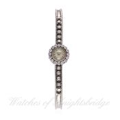 A LADIES 18K SOLID GOLD JAEGER LECOULTRE BRACELET WATCH CIRCA 1960s D: Silver dial with gilt markers