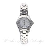 A LADIES STAINLESS STEEL TAG HEUER LINK BRACELET WATCH
CIRCA 2010, REF. WJ1319
D: Mother of pearl di