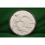 Circular cast metal plaque of angel in f