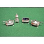 Group of four silver cruet items to comp