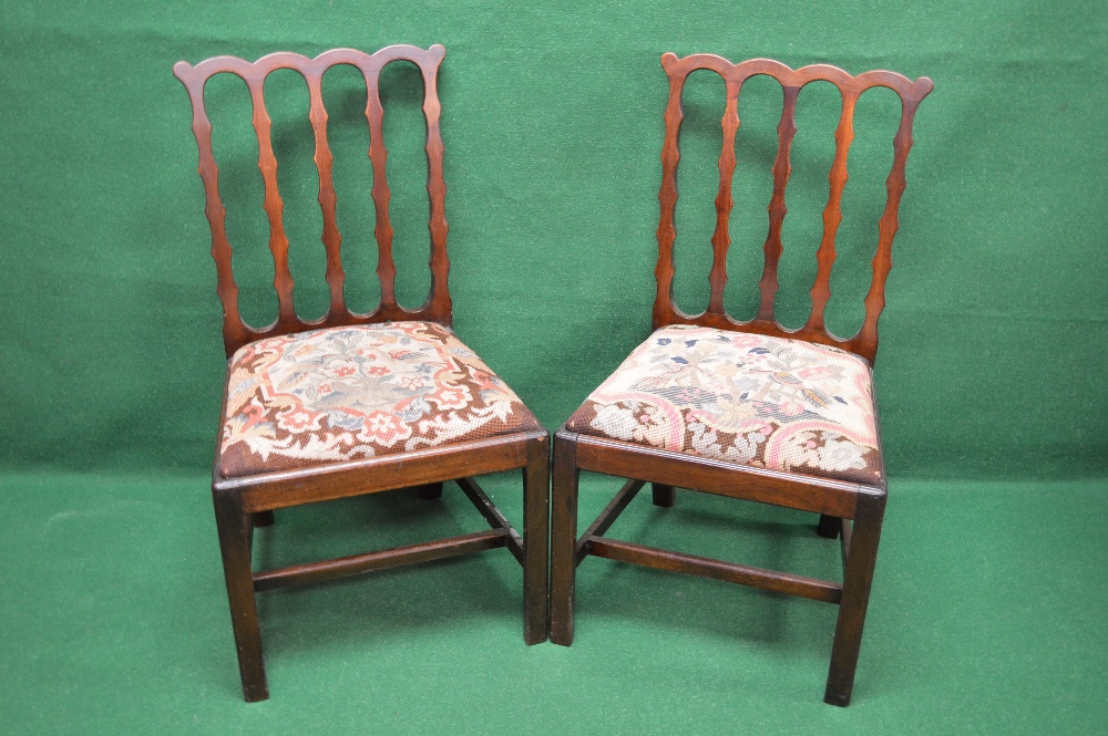 A pair of Chippendale mahogany dining ch