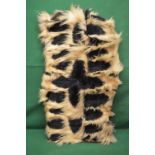 Group of Colobus monkey skins, mounted o