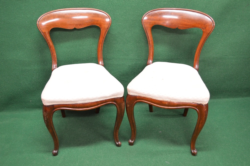 A set of four Victorian mahogany dining