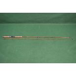 A two piece split cane fishing rod with