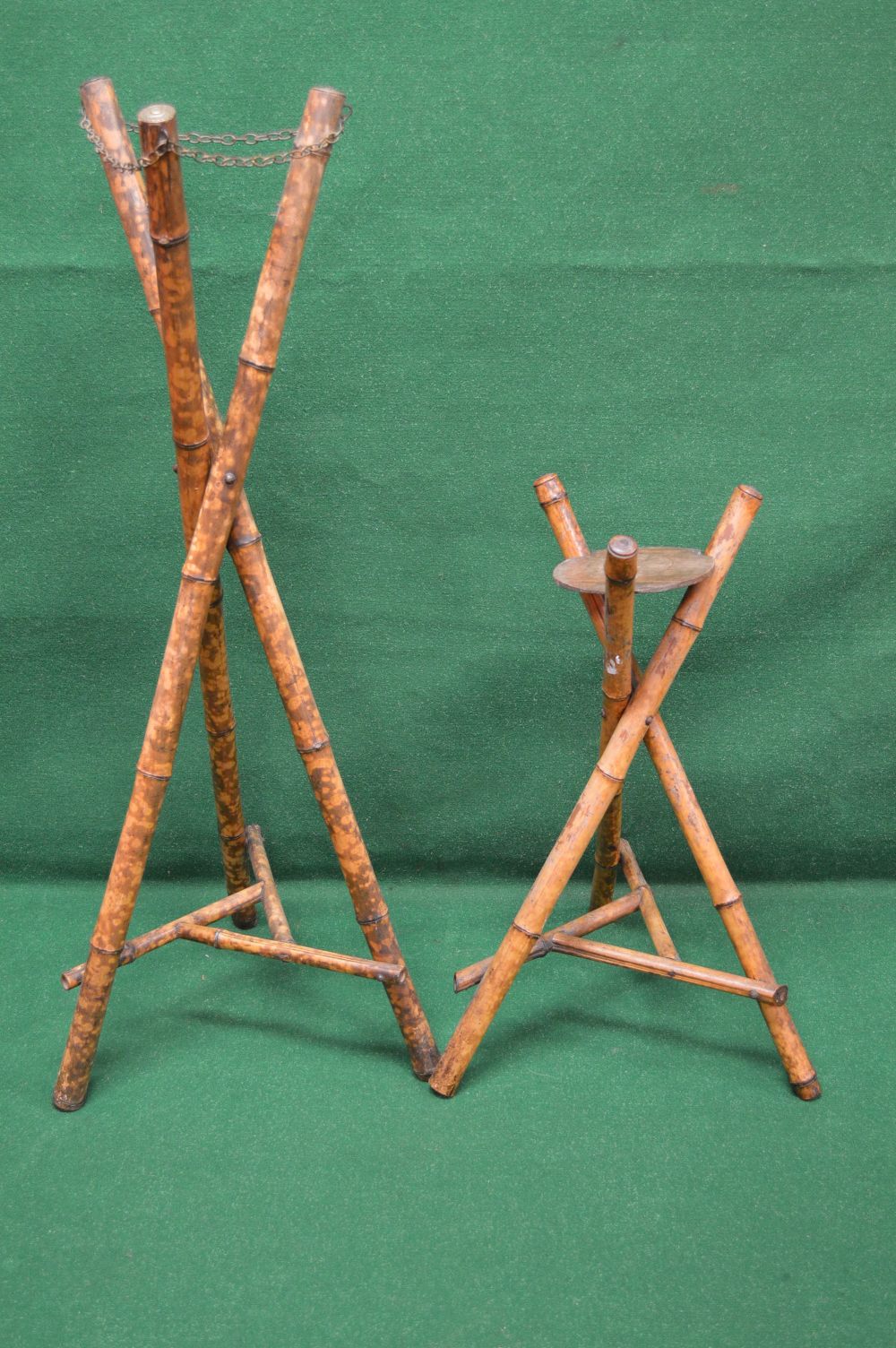 Two triform bamboo plant stands having s