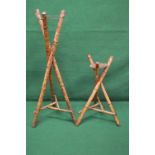 Two triform bamboo plant stands having s