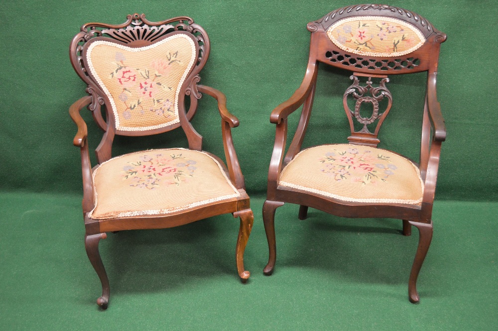 Two mahogany framed open armchairs havin