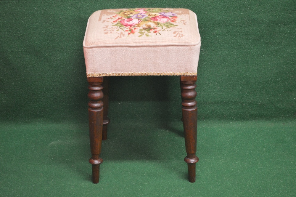 A mahogany framed dressing stool having