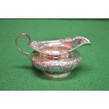 Garrard & Co. silver cream jug with flor