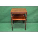 A mahogany two tier occasional table the