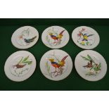 Set of six unmarked plates decorated wit