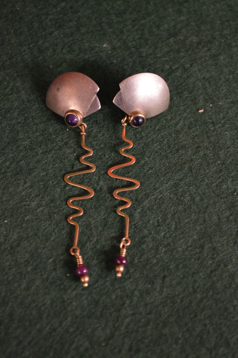 A pair of silver and amethyst earrings