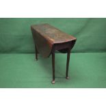 A mahogany drop leaf table having bow en