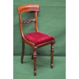 A rosewood cellists chair having curved