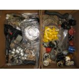 Two boxes of mostly BMC new old spares to include fuel tank senders, bushes, distributor caps, coils