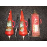 Two conical fire extinguishers with wall