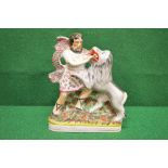 Staffordshire flat back figure of a Scotsman wrestling with a lion,