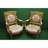 Pair of Louis XV style gilt wood carved armchairs having circular tapestry panel backs,