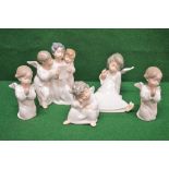 Group of five Lladro figures of winged cherubs