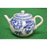 A 19th/20th century blue and white Oriental teapot decorated with cherry blossom and having