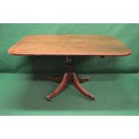 A Regency mahogany breakfast table having string inlaid rounded corner top supported by a single