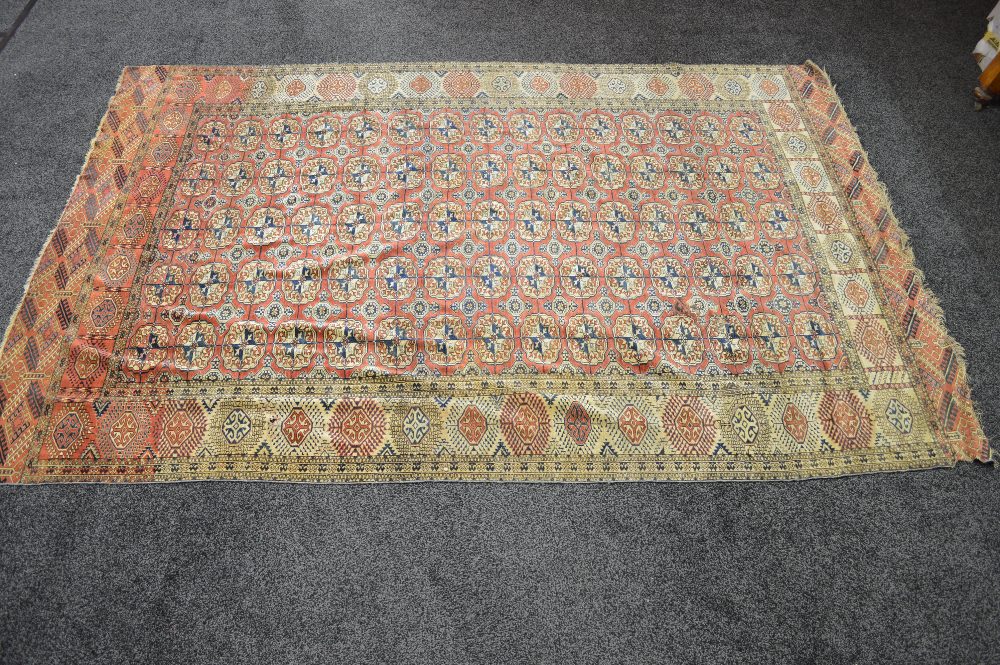 Red ground rug having blue,