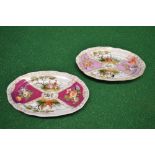 Pair of Augustus Rex oval shaped dishes having panels decorated with flowers and figures divided by