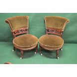 Good quality pair of Victorian nursing chairs with padded scroll backs and carved back rails over