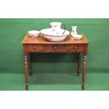 Mahogany washstand having single false drawer flanked by two short drawers with turned handles,