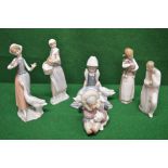 Group of six Lladro figures to include four of young ladies with farm animals