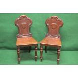 Pair of Victorian hall chairs with solid shaped backs and seats,