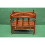20th century mahogany three section Canterbury having single drawer with ring handles and standing