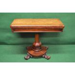Rosewood card table with rounded corners and blue baize on outward tapering bulbous column leading