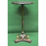 Art Nouveau cast iron base occasional table having circular ebonised top supported by reeded