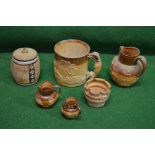 A quantity of Doulton war to comprise Harvestware jug, two other jugs, tankard,