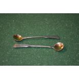 Pair of Georgian silver Fiddle pattern salt spoons with gilded bowls,