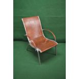 20th century polished aluminium framed armchair having leather back,