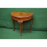 20th century burr walnut demi lune card table with cross banded top opening to reveal green baize,