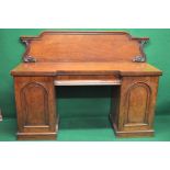 Victorian mahogany pedestal sideboard with breakfront and raised shaped back over single drawer and
