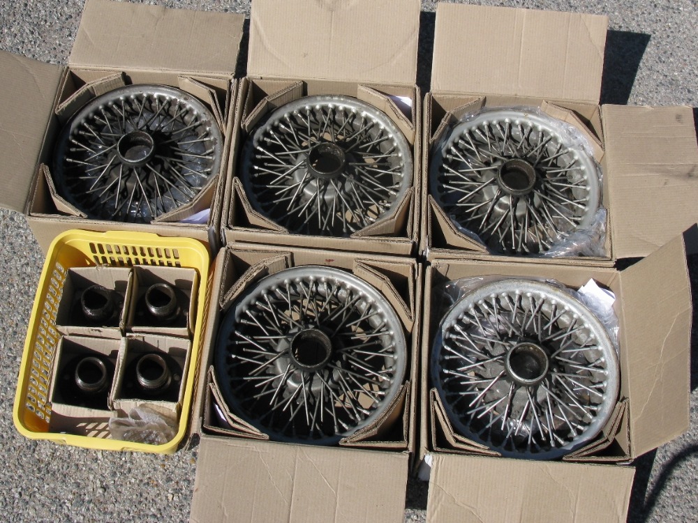 Set of five second hand painted wire wheels from a Triumph Vitesse  complete with four splined hubs