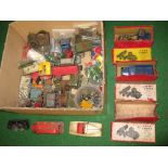 Box of die cast model, tinplate and clockwork parts and partial models,