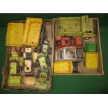 Tonka, two boxes of eleven dump trucks, bull dozers, trenchers etc,