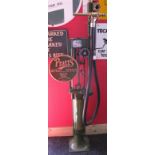 Skeleton petrol pump with hose and nozzle,