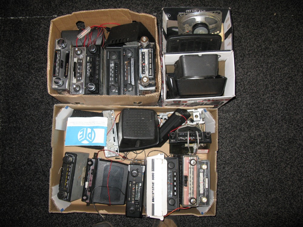 Four boxes of car radios and speakers by Pye, Astor, Philips, Motorola, Radiomobie,