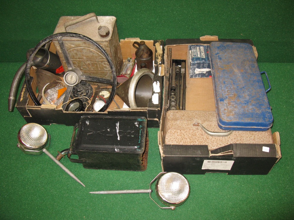 Two boxes of oil cans, spanners, socket sets, Wipac lamps,